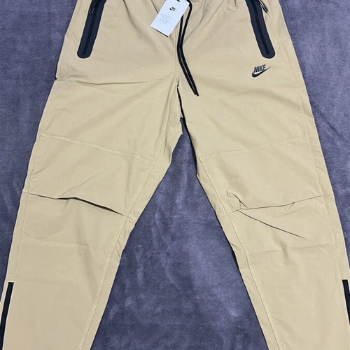 Nike pants new beige size L