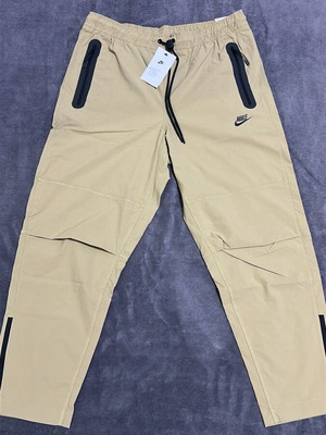 Nike pants new beige size L
