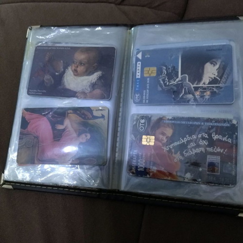 Collectible phone cards used with album