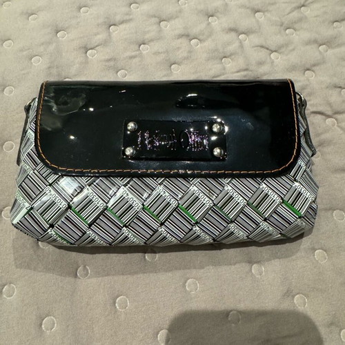 Crossbody bag original with strap in excellent condition