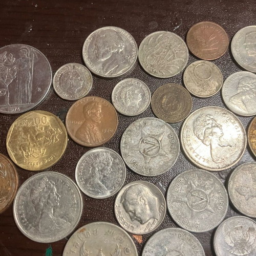 Lot of 44 foreign coins used from Cuba Venezuela Argentina China and more