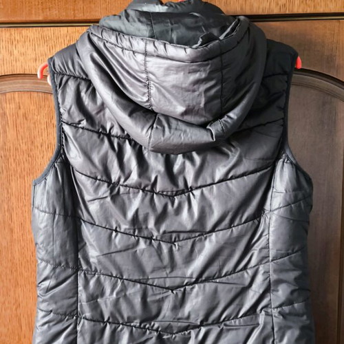 H&M sleeveless women's jacket black like new, size 42