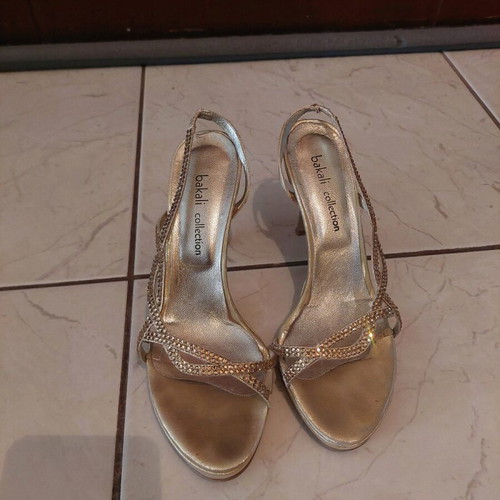 Gold sandals used, size 38