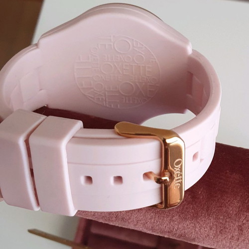 Oxette pink women's watch with rubber strap and pink gold dial like new