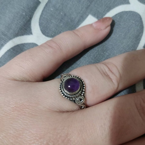 Ring with purple stone like new