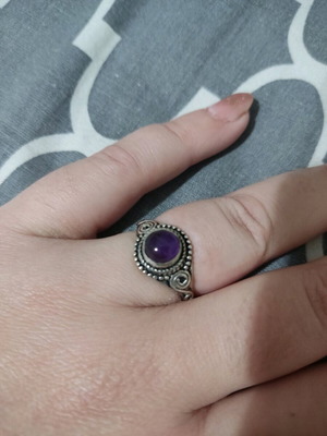 Ring with purple stone like new