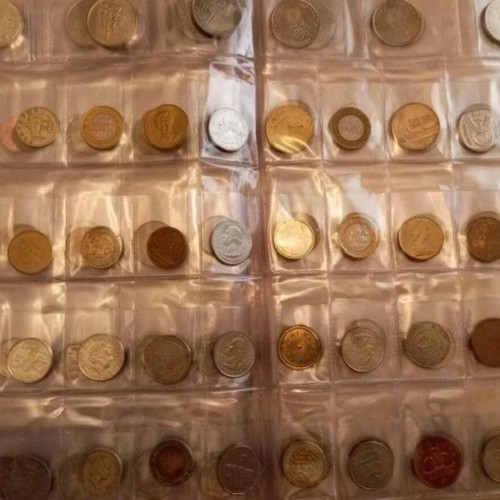 Coin album used with 159 coins from various countries