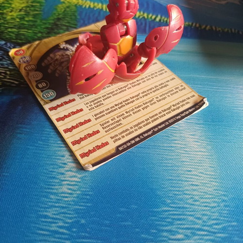 Bakugan figure set used with battle cards Aquos El Condor and Pyrus Aranaut