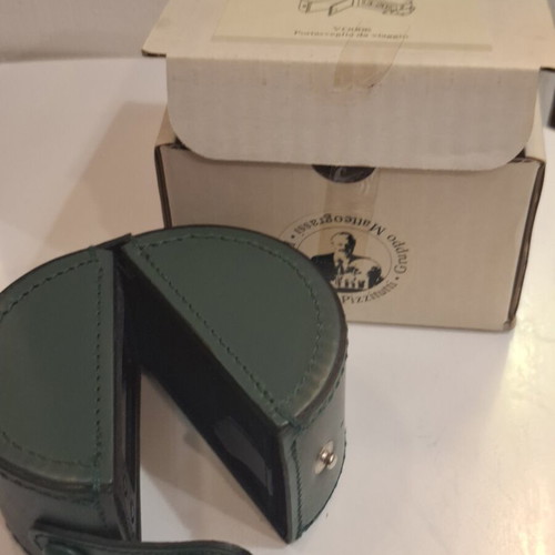 Cylindrical leather vintage travel case with small clock by Giorgio Pizzitutti