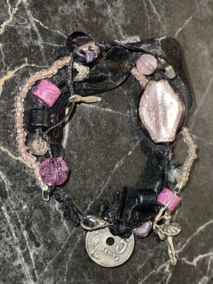 Bracelet with charms new in black and purple shades
