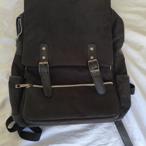 Backpack canvas black used with multiple compartments