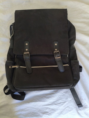 Backpack canvas black used with multiple compartments
