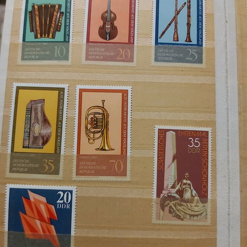 Mini album 16 pages like new with 36 unsealed series from East Germany