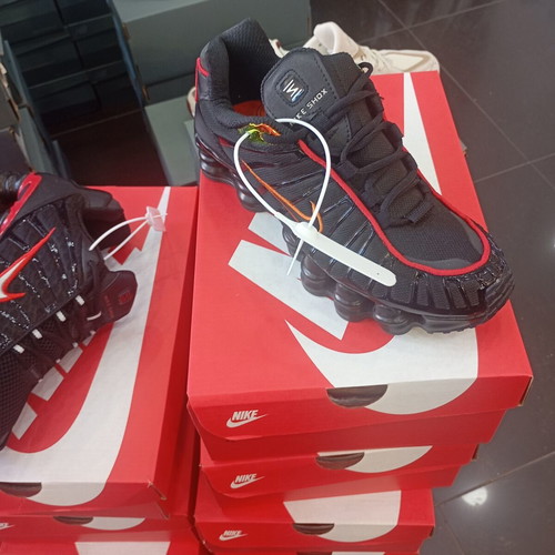 Nike Shox athletic shoes new, black and red