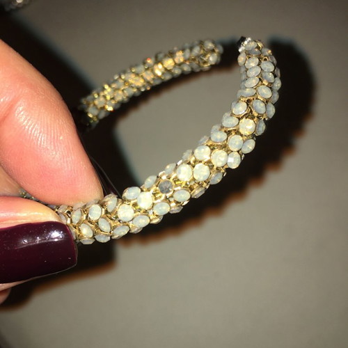 Swarovski stones used, large bronze hoop earrings with one missing stone
