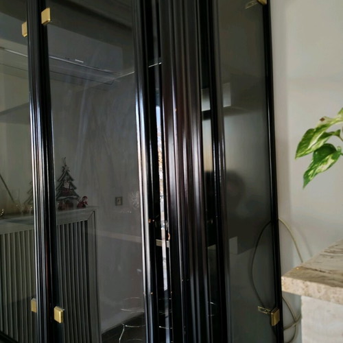 Wooden showcase like new, black with interior light and 8 deep shelves