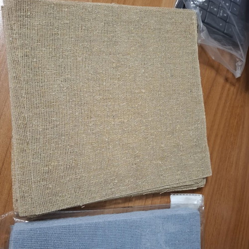 Set of 2 gauze packs in white and blue colors, new