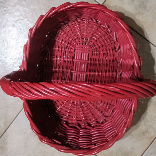 Two woven baskets in red and brown