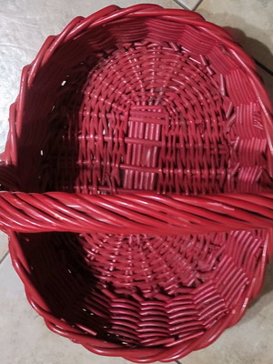 Two woven baskets in red and brown