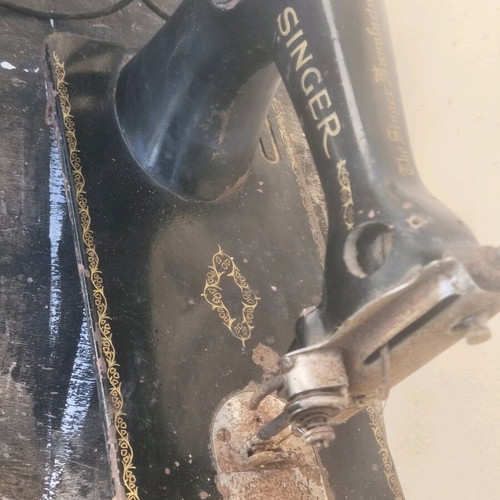Antique sewing machine used with some rust and not working