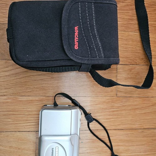Olympus Superzoom 70G camera used with case
