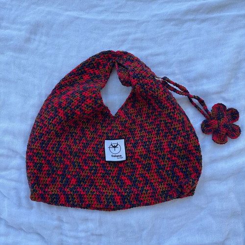 Crochet shoulder bag with flower charm, multicolor
