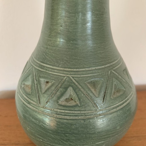 Handmade ceramic vase with carved geometric patterns, like new