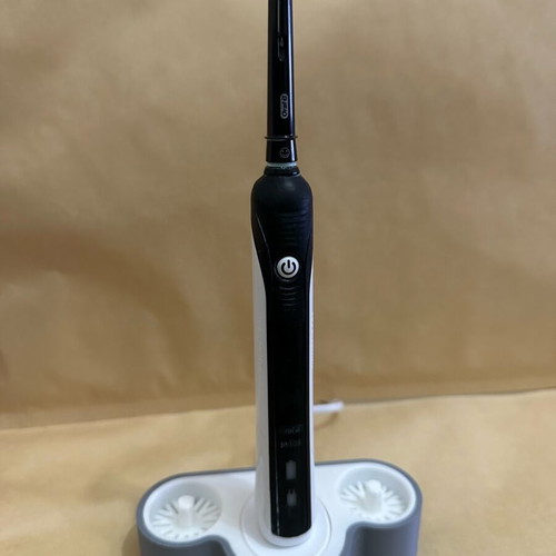 Organization stand for 2 Oral-B electric toothbrushes with charging slot and drainage 3D printed