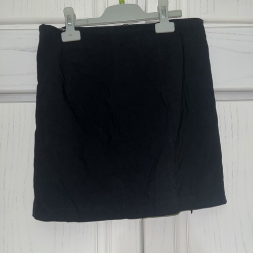 M&F black skirt with side and front zippers, size M