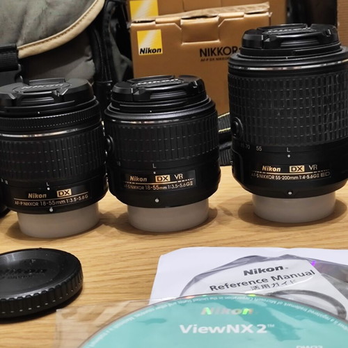 Nikon D3500 DSLR camera body with 3 lenses and accessories