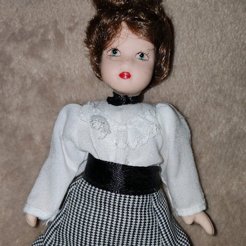 Porcelain doll ~15cm like new