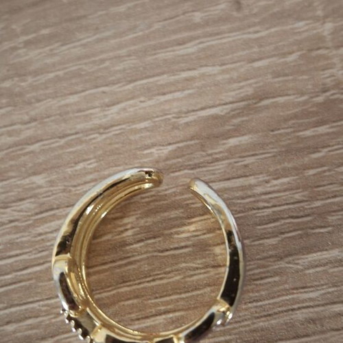 Steel ring in gold color with adjustable opening