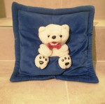 Pillow with teddy bear used