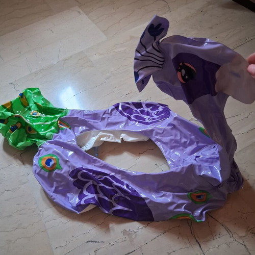 Inflatable peacock float like new, suitable for children up to 3 years