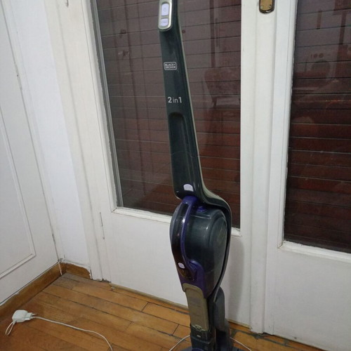 Black and Decker stick vacuum used, defective battery, with charger and brush