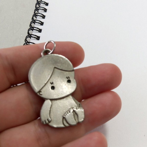 Embossed Baby Motif silver color, like new