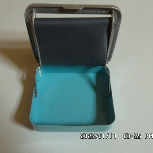 Tobacco case with paper holder used