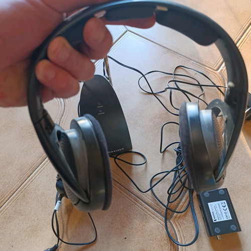 Sennheiser wireless headphones with transmitter base for TV like new
