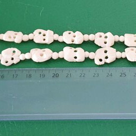 Carved vintage bone necklace with elephant pendant