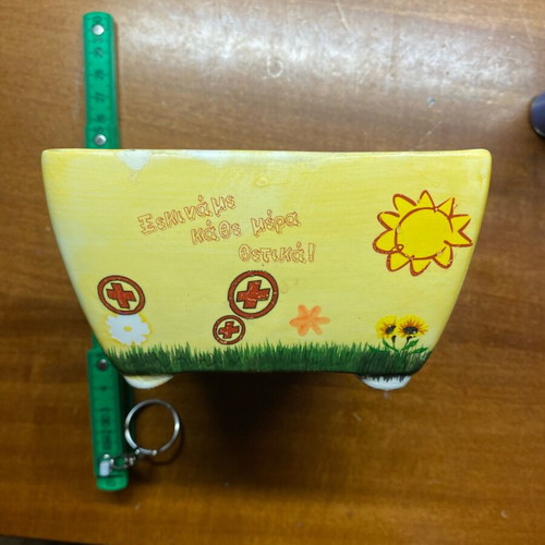 Clay container used with painted design