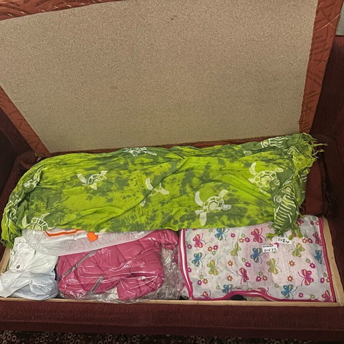 Two-seater sofa used with storage space