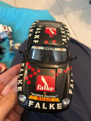 Urago Porsche toy car figure used in good condition