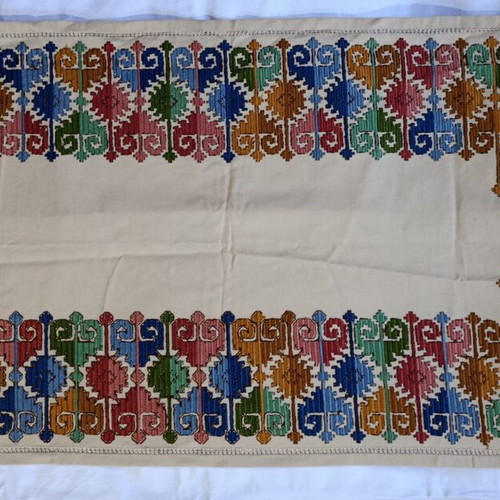 Handmade table runner used, traditional colorful geometric embroidery