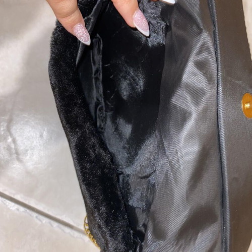 Evening shoulder bag like new, black with gold details