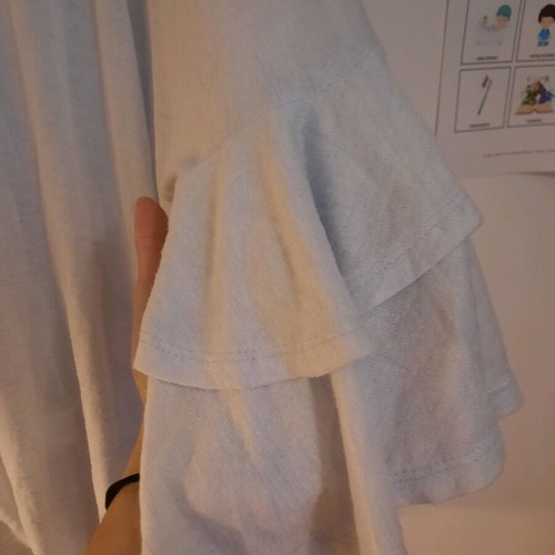 Spring blouse airy, like new, light blue with ruffles