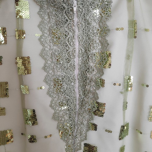 Dress green light with sequins size 48 like new