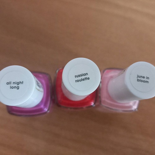 Essie nail polish in three colors like new, 2 glitters and 1 plain