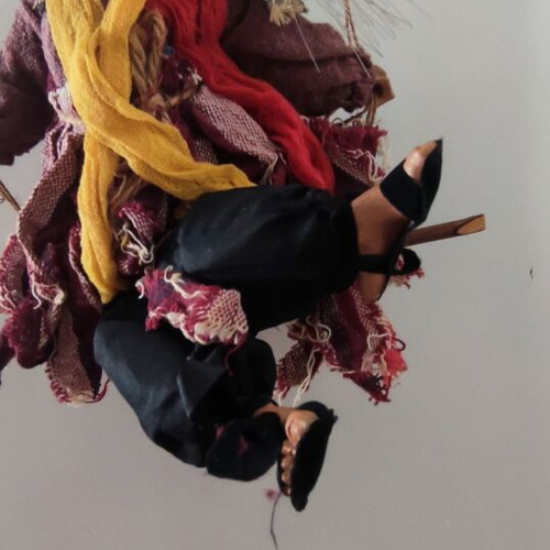 Witch figure used with sound and light-up hair