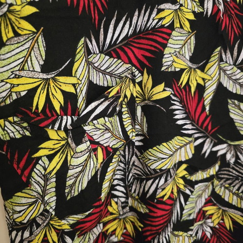 Women's sleeveless summer dress with tropical print