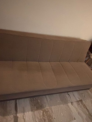 Student furniture set with sofa bed, chair, and shelf